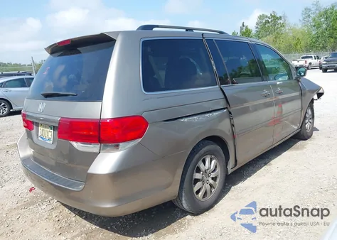2010 Honda Odyssey Ex-L z USA, uszkodzony, nr VIN 5FNRL3H76AB065214
